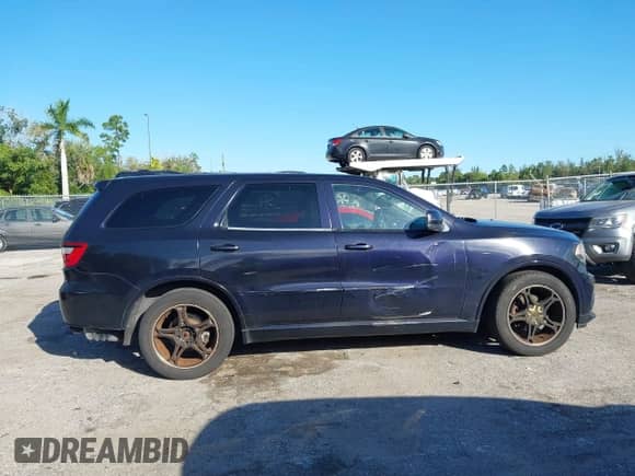 2014 Dodge Durango SXT z VIN 1C4RDHAG6EC313727, wystawiony jako IAAI lot #43519980 z przebiegiem 193 633 mil mil oraz . Historia ofert i sprzedaży dostępna na DreamBid. Obrazek 13.