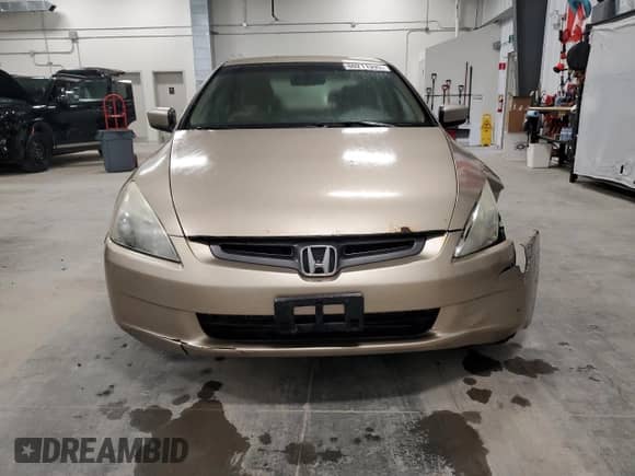 2003 Honda Accord LX z VIN 1HGCM56443A816895, wystawiony jako Copart lot #60211995 z przebiegiem 268 839 mil mil oraz Czysty tytuł • Clean title. Historia ofert i sprzedaży dostępna na DreamBid. Obrazek 5.