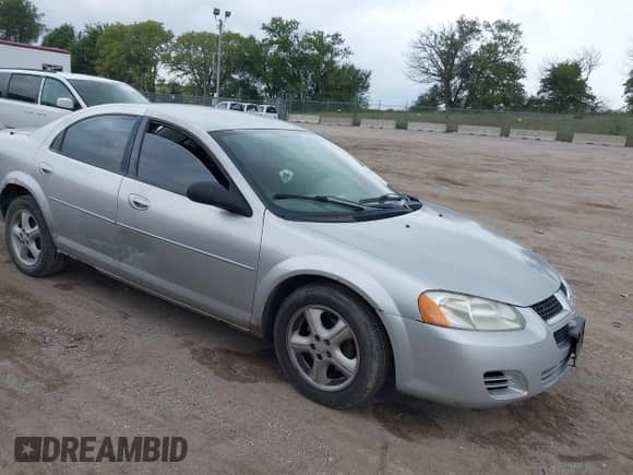 2006 Dodge Stratus SXT with VIN 1B3EL46X06N133671, listed as a IAAI auction lot 43118427 with 215,024 mi miles and . Bid and sale history available at DreamBid. Image 1.