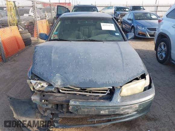 2001 Toyota Camry CE with VIN 4T1BG22K61U856097, listed as a IAAI auction lot 43319135 with Not provided miles and . Bid and sale history available at DreamBid. Image 12.