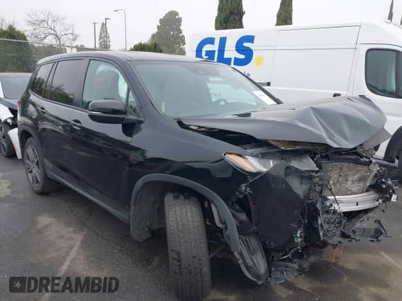 2021 Honda Passport EX-L with VIN 5FNYF7H5XMB013923, listed as a IAAI auction lot 41669295 with 42,969 mi miles and . Bid and sale history available at DreamBid. Image 12.
