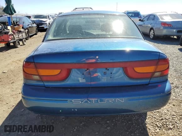 2002 Saturn SL с VIN 1G8ZK54772Z130842, выставлен на аукционе Copart как лот 84471205 с пробегом 65 826 миль миль и Списание • Salvage title. История ставок и продаж доступна на DreamBid. Изображение 6.