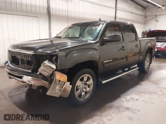 2010 GMC Sierra 1500 SLT with VIN 3GTRKWE30AG242923, listed as a IAAI auction lot 41854848 with 209,977 mi miles and . Bid and sale history available at DreamBid. Image 2.