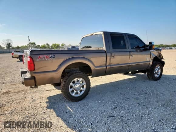 2015 Ford F-250 Lariat с VIN 1FT7W2BT5FEC70093, выставлен на аукционе Copart как лот 71149215 с пробегом 128 637 миль миль и Списание • Salvage title. История ставок и продаж доступна на DreamBid. Изображение 3.