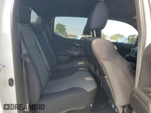 2023 Toyota Tacoma SR5 с VIN 3TMDZ5BN6PM147282, выставлен на аукционе Copart как лот 82028355 с пробегом 51 704 миль миль и Списание • Salvage title. История ставок и продаж доступна на DreamBid. Изображение 10.