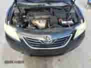 2007 Toyota Camry CE z VIN JTNBE46K573059947, wystawiony jako Copart lot #82554865 z przebiegiem 233 671 mil mil oraz Czysty tytuł • Clean title. Historia ofert i sprzedaży dostępna na DreamBid. Obrazek 11.