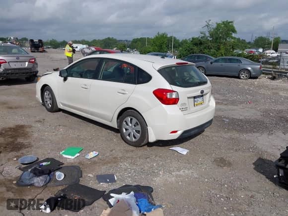 2014 Subaru Impreza 2.0i with VIN JF1GPAA69EH328650, listed as a IAAI auction lot 42656811 with 121,175 mi miles and . Bid and sale history available at DreamBid. Image 3.