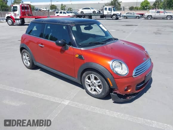 2013 MINI Hardtop with VIN WMWSU3C50DT682661, listed as a IAAI auction lot 42294482 with 114,066 mi miles and . Bid and sale history available at DreamBid. Image 1.