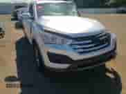 2015 Hyundai Santa Fe z VIN 5XYZTDLB7FG301905, wystawiony jako Copart lot #70538585 z przebiegiem 76 277 mil mil oraz Szkoda całkowita • Salvage title. Historia ofert i sprzedaży dostępna na DreamBid. Obrazek 15.