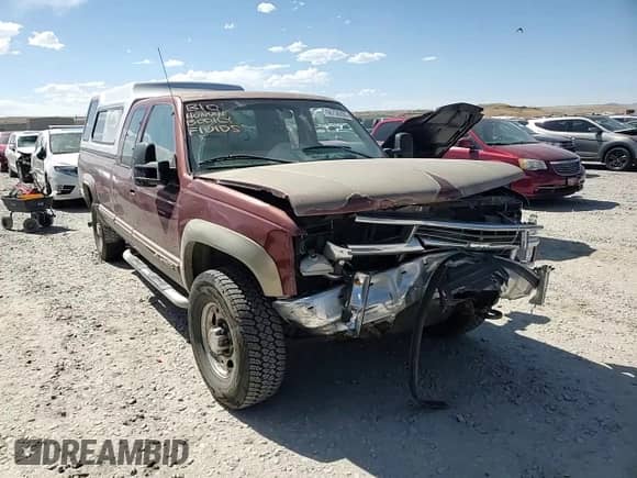 1998 Chevrolet Silverado 2500 с VIN 1GCGK29RXWE127131, выставлен на аукционе Copart как лот 66736205 с пробегом 189 791 миль миль и Списание • Salvage title. История ставок и продаж доступна на DreamBid. Изображение 13.