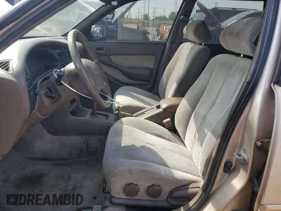 1996 Toyota Camry with VIN 4T1EG12K5TU670819, listed as a Copart auction lot 80436145 with 169,839 mi miles and Salvage title. Bid and sale history available at DreamBid. Image 7.