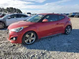 2013 Hyundai Veloster Turbo z VIN KMHTC6AE5DU167742, wystawiony jako Copart lot #84651835 z przebiegiem 102 386 mil mil oraz Czysty tytuł • Clean title. Historia ofert i sprzedaży dostępna na DreamBid. Obrazek 1.
