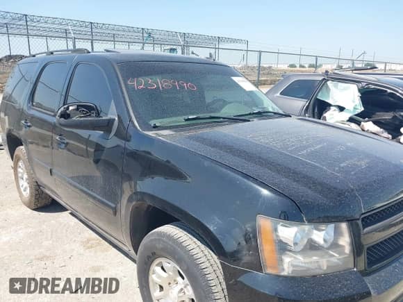 2007 Chevrolet Tahoe LTZ with VIN 1GNFC13047R286757, listed as a IAAI auction lot 42318990 with 240,729 mi miles and . Bid and sale history available at DreamBid. Image 12.