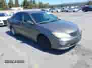 2005 Toyota Camry STD with VIN 4T1BE32K15U989898, listed as a IAAI auction lot 42880938 with 210,464 mi miles and . Bid and sale history available at DreamBid. Image 1.