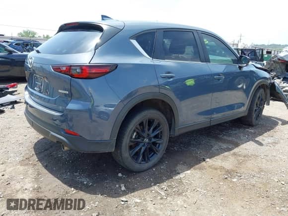 2023 Mazda CX-5 S Preferred z VIN JM3KFBCM7P0164798, wystawiony jako IAAI lot #42781475 z przebiegiem 95 845 mil mil oraz . Historia ofert i sprzedaży dostępna na DreamBid. Obrazek 4.