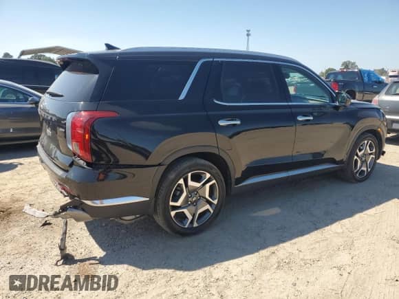 2023 Hyundai Palisade Limited с VIN KM8R5DGE7PU533480, выставлен на аукционе Copart как лот 80137035 с пробегом 57 827 миль миль и Списание • Salvage title. История ставок и продаж доступна на DreamBid. Изображение 3.