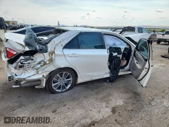 2015 Toyota Camry LE с VIN 4T1BD1FK1FU175186, выставлен на аукционе Copart как лот 69825435 с пробегом Не указан миль и Списание • Salvage title. История ставок и продаж доступна на DreamBid. Изображение 3.