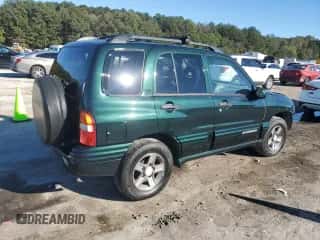 2003 Chevrolet Tracker LT z VIN 2CNBE634836932949, wystawiony jako Copart lot #81057984 z przebiegiem 64 240 mil mil oraz Szkoda całkowita • Salvage title. Historia ofert i sprzedaży dostępna na DreamBid. Obrazek 3.