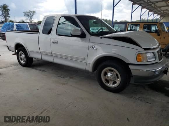 2002 Ford F-150 XL с VIN 1FTRX17L72NB31506, выставлен на аукционе Copart как лот 83773615 с пробегом Не указан миль и Списание • Salvage title. История ставок и продаж доступна на DreamBid. Изображение 4.
