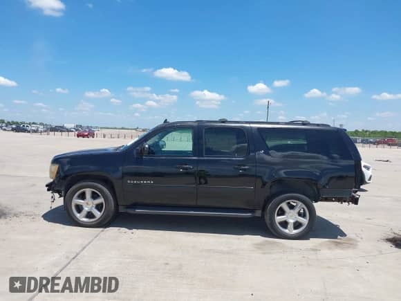 2013 Chevrolet Suburban LT with VIN 1GNSKJE71DR168382, listed as a IAAI auction lot 42821206 with 209,210 mi miles and . Bid and sale history available at DreamBid. Image 14.