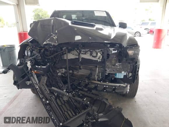 2024 Toyota Tacoma SR5 z VIN 3TMKB5FN1RM019542, wystawiony jako IAAI lot #43241656 z przebiegiem 14 968 mil mil oraz . Historia ofert i sprzedaży dostępna na DreamBid. Obrazek 12.