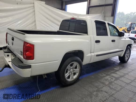 2007 Dodge Dakota SLT с VIN 1D7HE48P87S182418, выставлен на аукционе Copart как лот 58502375 с пробегом 78 305 миль миль и Списание • Salvage title. История ставок и продаж доступна на DreamBid. Изображение 3.