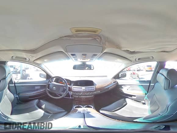 2007 BMW 7 Series 750i z VIN WBAHL83577DT10369, wystawiony jako Copart lot #49285885 z przebiegiem 95 291 mil mil oraz Szkoda całkowita • Salvage title. Historia ofert i sprzedaży dostępna na DreamBid. Obrazek 13.