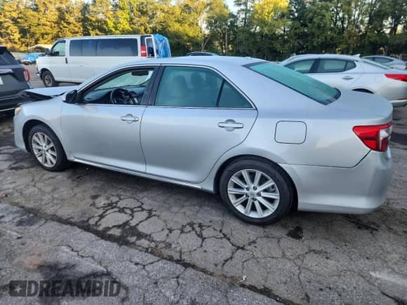 2014 Toyota Camry SE с VIN 4T1BF1FKXEU401573, выставлен на аукционе Copart как лот 84536805 с пробегом 108 154 миль миль и Списание • Salvage title. История ставок и продаж доступна на DreamBid. Изображение 2.