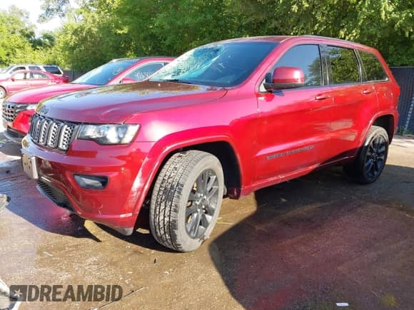 2022 Jeep Grand Cherokee Laredo X with VIN 1C4RJFAG4NC149505, listed as a IAAI auction lot 42583914 with 71,316 mi miles and . Bid and sale history available at DreamBid. Image 18.