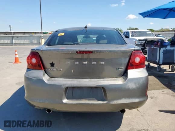 2013 Dodge Avenger SXT with VIN 1C3CDZCGXDN682123, listed as a Copart auction lot 81931835 with 144,236 mi miles and Salvage title. Bid and sale history available at DreamBid. Image 6.