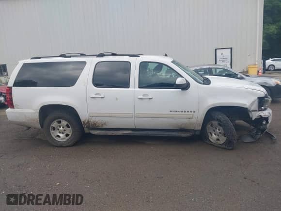 2009 Chevrolet Suburban 2LT с VIN 1GNFK26329R263513, выставлен на аукционе IAAI как лот 42631642 с пробегом 184 323 миль миль и . История ставок и продаж доступна на DreamBid. Изображение 13.