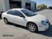 2005 Dodge Neon SXT with VIN 1B3ES56C05D171072, listed as a Copart auction lot 61170435 with 218,495 mi miles and Salvage title. Bid and sale history available at DreamBid. Image 4.