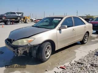 2003 Toyota Camry XLE с VIN 4T1BE32K33U125786, выставлен на аукционе Copart как лот 84923995 с пробегом 287 877 миль миль и Списание • Salvage title. История ставок и продаж доступна на DreamBid. Изображение 1.