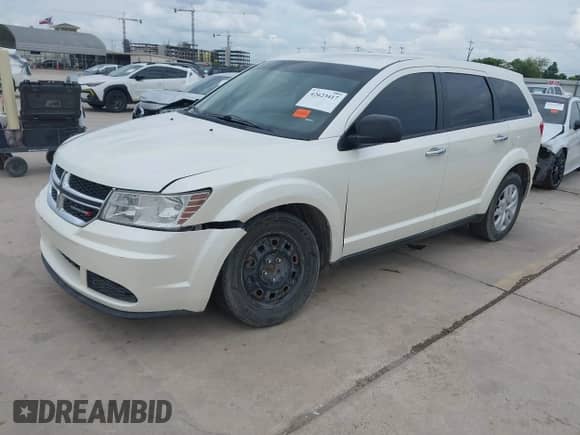 2014 Dodge Journey American Value with VIN 3C4PDCABXET101139, listed as a IAAI auction lot 42623417 with 151,744 mi miles and . Bid and sale history available at DreamBid. Image 20.