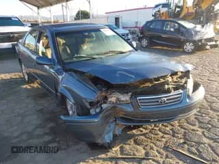 2000 Toyota Camry LE z VIN JT2BF28K9Y0249927, wystawiony jako IAAI lot #43451955 z przebiegiem Nie podano mil oraz . Historia ofert i sprzedaży dostępna na DreamBid. Obrazek 1.