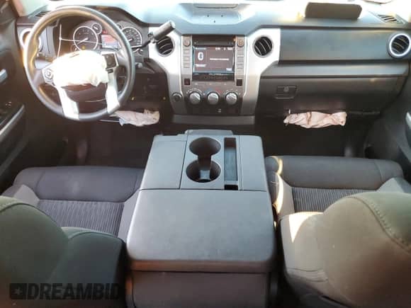 2016 Toyota Tundra SR5 с VIN 5TFUW5F14GX571537, выставлен на аукционе Copart как лот 82139135 с пробегом 103 385 миль миль и Списание • Salvage title. История ставок и продаж доступна на DreamBid. Изображение 8.
