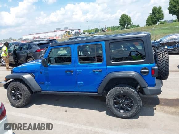 2022 Jeep Wrangler Unlimited Willys Sport с VIN 1C4HJXDM6NW141603, выставлен на аукционе IAAI как лот 42687693 с пробегом 37 180 миль миль и . История ставок и продаж доступна на DreamBid. Изображение 14.