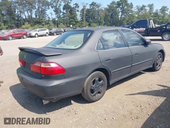 2000 Honda Accord EX z VIN 1HGCG6678YA100080, wystawiony jako IAAI lot #40343654 z przebiegiem 90 527 mil mil oraz . Historia ofert i sprzedaży dostępna na DreamBid. Obrazek 4.