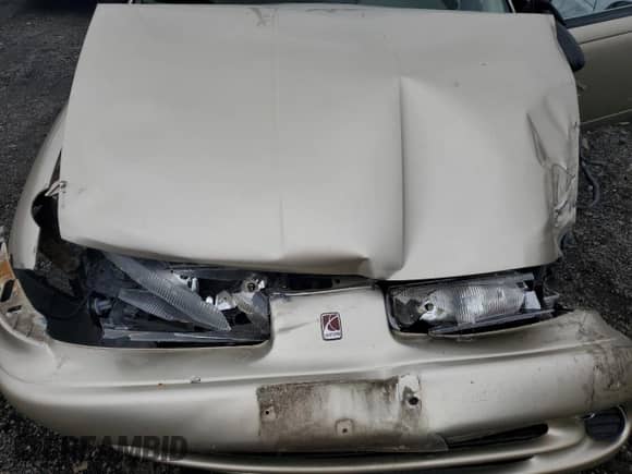 1997 Saturn SW with VIN 1G8ZK827XVZ120119, listed as a Copart auction lot 57083245 with 199,971 mi miles and Salvage title. Bid and sale history available at DreamBid. Image 11.