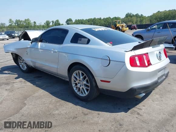 2012 Ford Mustang V6 with VIN 1ZVBP8AM7C5220275, listed as a IAAI auction lot 43152834 with 211,238 mi miles and . Bid and sale history available at DreamBid. Image 3.
