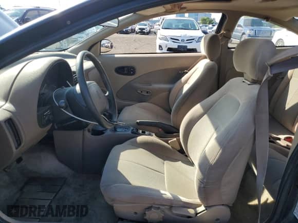 1998 Saturn SC with VIN 1G8ZH1278WZ280085, listed as a Copart auction lot 62767845 with 95,915 mi miles and Salvage title. Bid and sale history available at DreamBid. Image 7.
