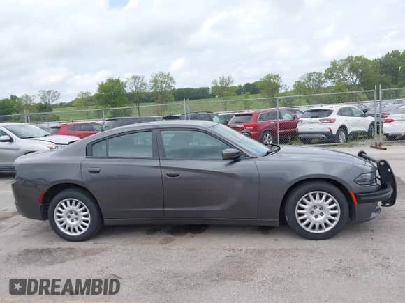 2020 Dodge Charger Police z VIN 2C3CDXKT3LH127511, wystawiony jako IAAI lot #42779533 z przebiegiem 134 886 mil mil oraz . Historia ofert i sprzedaży dostępna na DreamBid. Obrazek 14.