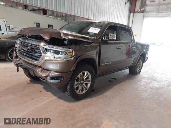 2020 Ram 1500 Longhorn with VIN 1C6SRFKT1LN275397, listed as a IAAI auction lot 42733634 with 101,019 mi miles and . Bid and sale history available at DreamBid. Image 2.
