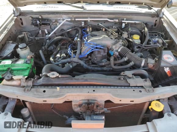 2004 Nissan Frontier XE z VIN 1N6ED29X64C430767, wystawiony jako Copart lot #62191075 z przebiegiem 110 110 mil mil oraz Szkoda całkowita • Salvage title. Historia ofert i sprzedaży dostępna na DreamBid. Obrazek 11.