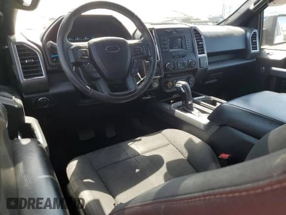 2016 Ford F-150 XLT with VIN 1FTFX1EG4GKF49765, listed as a Copart auction lot 54709385 with 126,054 mi miles and Salvage title. Bid and sale history available at DreamBid. Image 8.