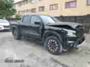 2023 Nissan Frontier Pro-X with VIN 1N6ED1EJ7PN646860, listed as a Copart auction lot 59143685 with 35,755 mi miles and Salvage title. Bid and sale history available at DreamBid. Image 4.