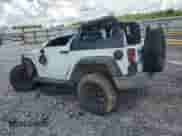 2015 Jeep Wrangler Willys Wheeler with VIN 1C4AJWAG7FL704493, listed as a Copart auction lot 63474255 with Not provided miles and Salvage title. Bid and sale history available at DreamBid. Image 2.