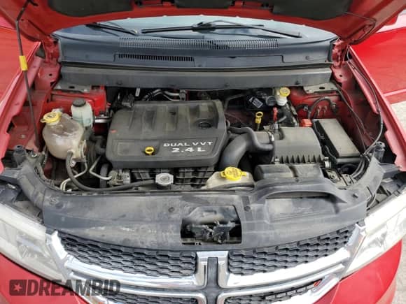 2012 Dodge Journey SXT z VIN 3C4PDCBB2CT323329, wystawiony jako Copart lot #56891385 z przebiegiem 139 027 mil mil oraz Szkoda całkowita • Salvage title. Historia ofert i sprzedaży dostępna na DreamBid. Obrazek 12.