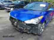 2013 Hyundai Veloster Turbo с VIN KMHTC6AE0DU141811, выставлен на аукционе IAAI как лот 43188913 с пробегом 117 067 миль миль и . История ставок и продаж доступна на DreamBid. Изображение 6.