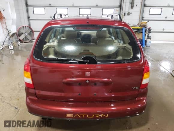 2000 Saturn LW with VIN 1G8JW82R2YY649240, listed as a Copart auction lot 77682734 with Not provided miles and Non repairable. Bid and sale history available at DreamBid. Image 6.